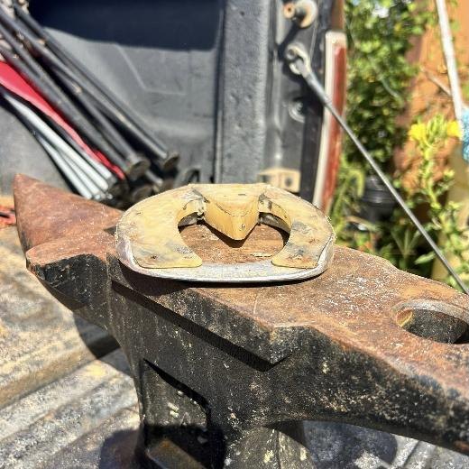 A shoe with a pad shaped on the anvil